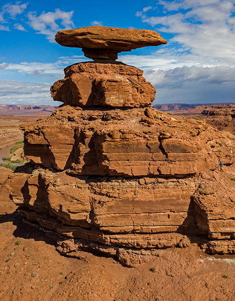 A rock formation with various rocks on top of each other.