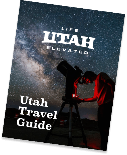 a travel guide for utah with a starry sky on the cover