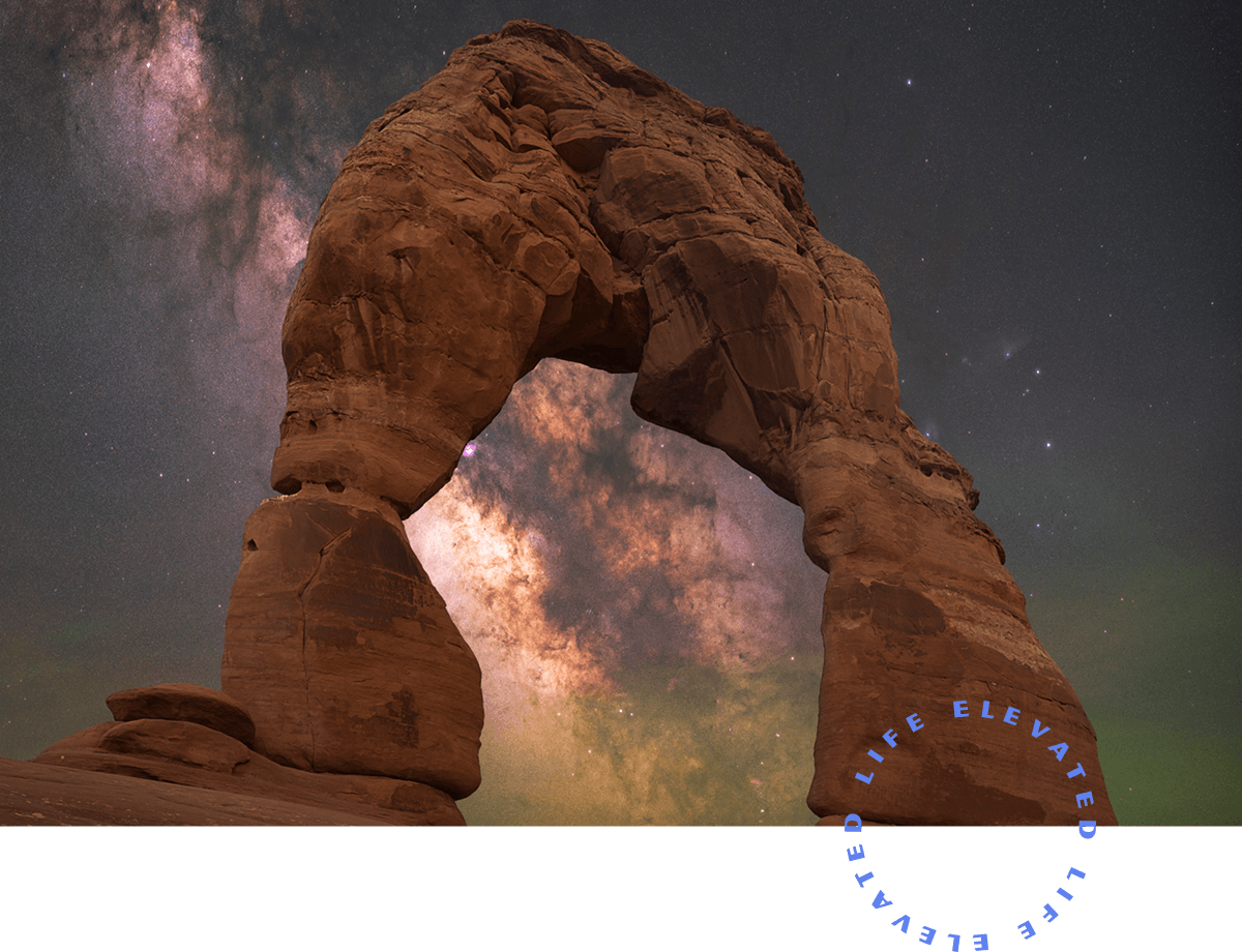 a rock formation against a background with a dark starry sky