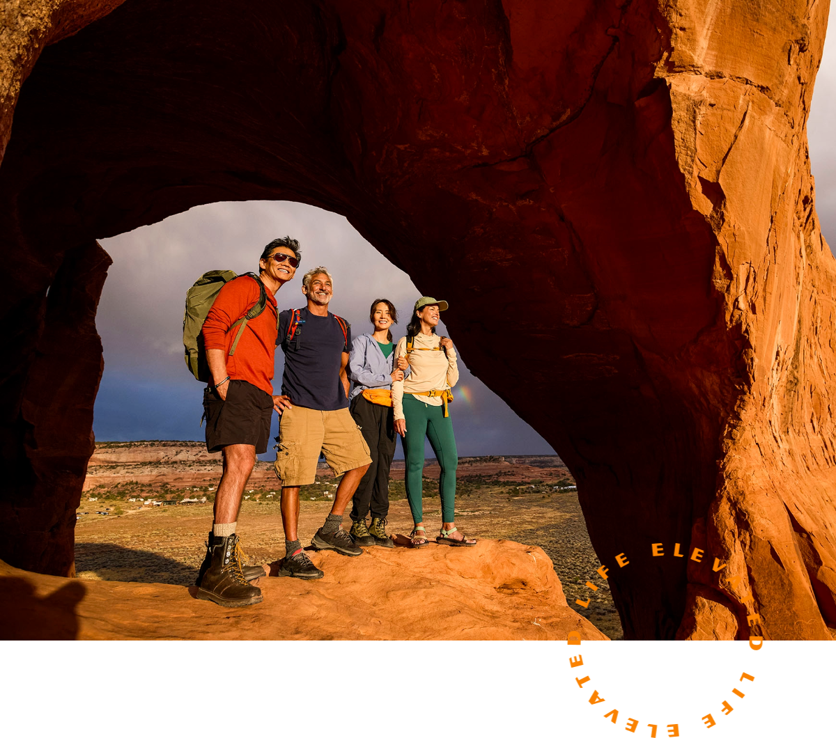 a group of people standing in a cave