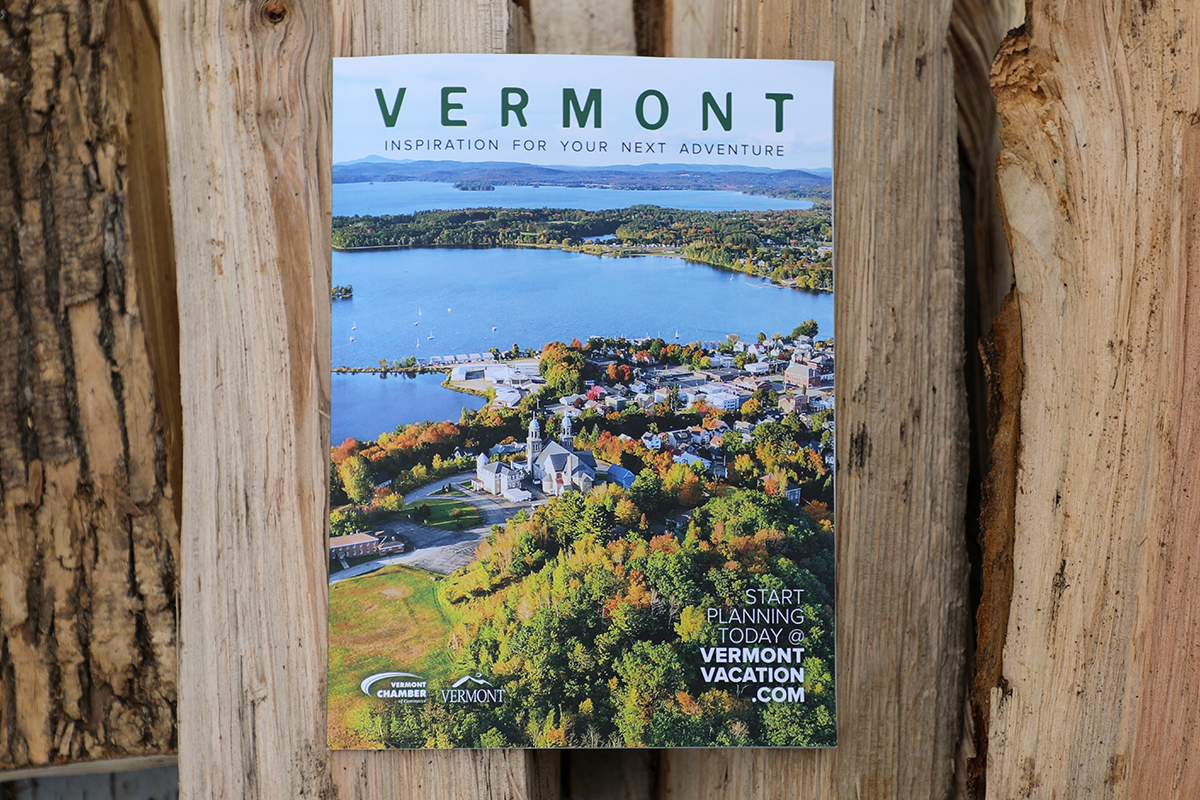 Cover of the Vermont Inspiration travel guide featuring a Vermont landscape.