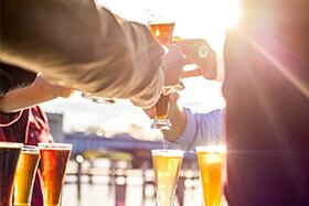 Friends enjoying a variety of drinks