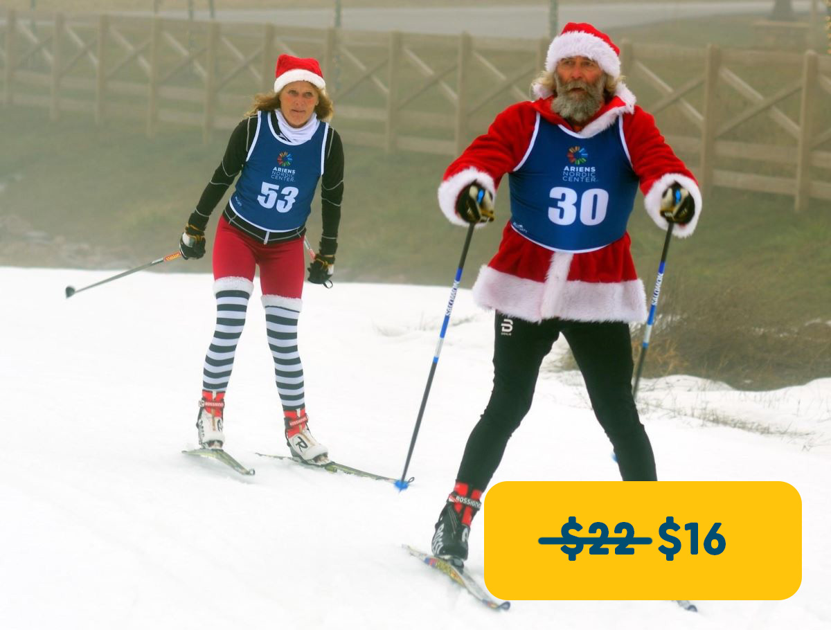 People dressed up as santa for a nordic cross country ski race