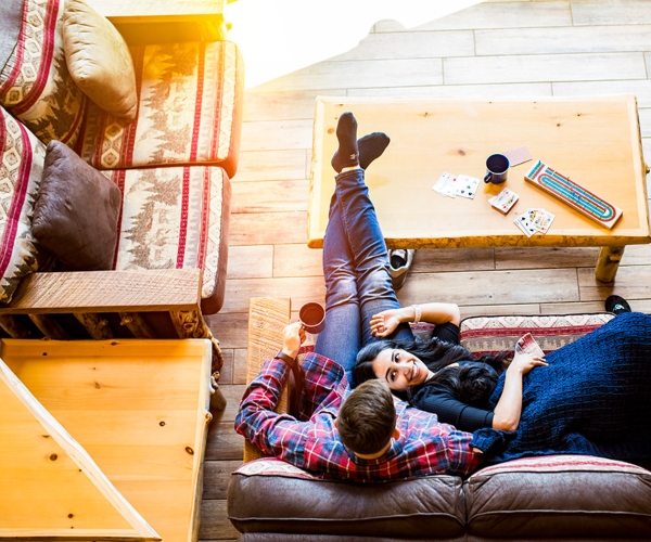 couple relaxing in a cozy cabin 