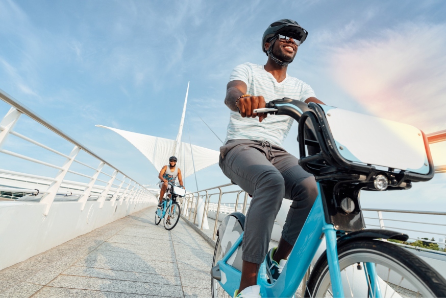 friends riding bublr bikes downtown milwaukee 