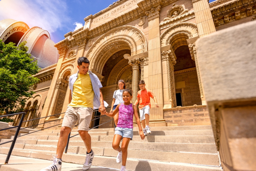 family walking down front steps of historic yerkes observatory