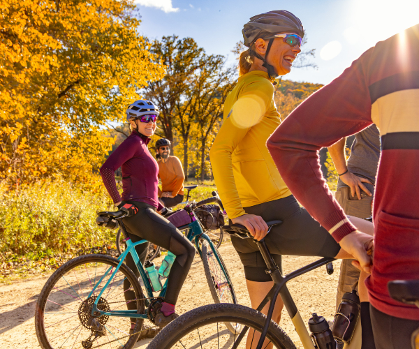 group of friends on bike trail in the fall 