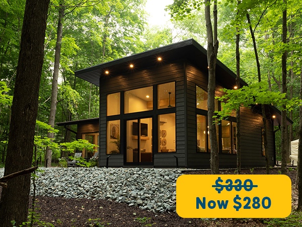 exterior view of a cabin in the woods