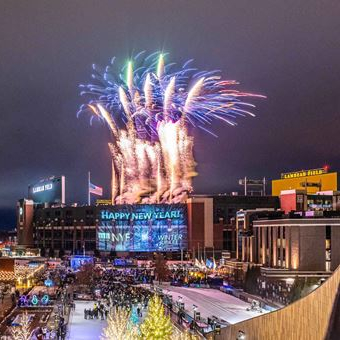 fireworks behind lambeau field on new years eve 