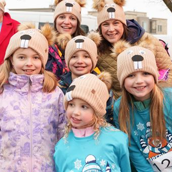 group of young girls and their moms at frozen fest
