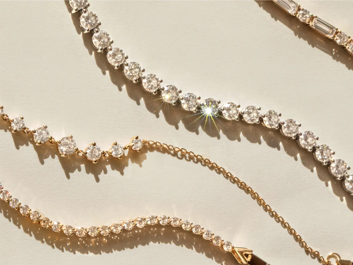 Tennis necklaces and bracelets featuring VRAI created diamonds