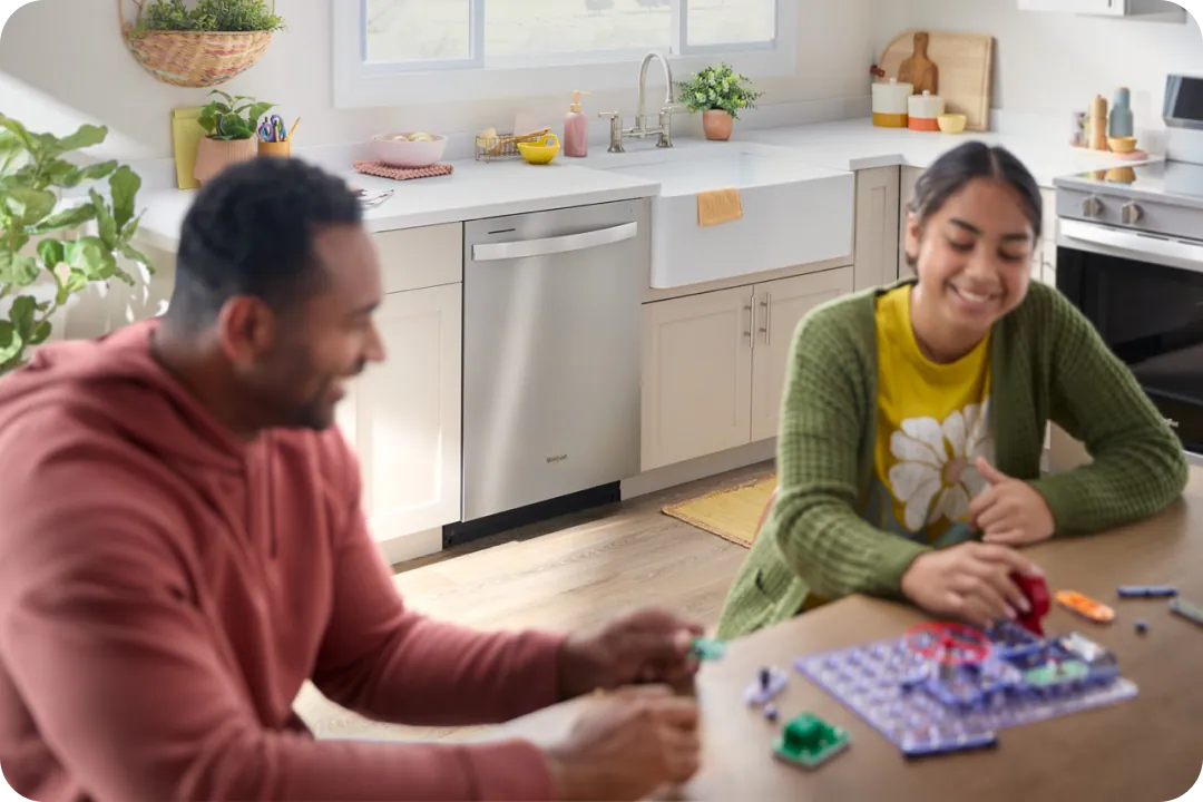 Family in front of dishwasher