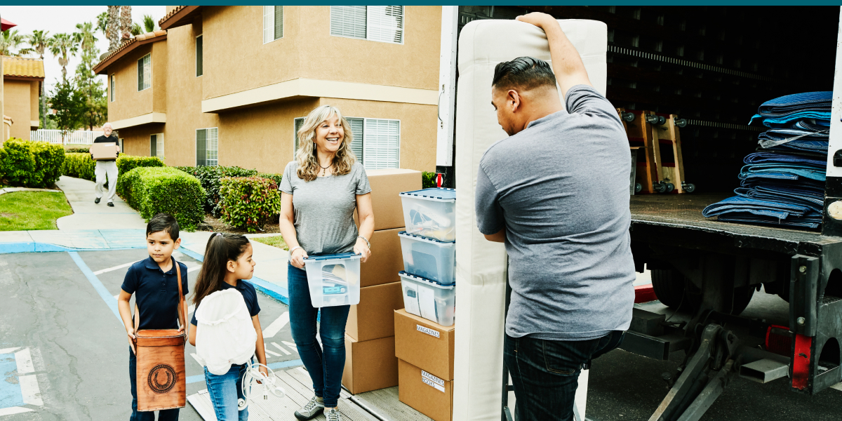 Family Filling Up a Moving Truck 