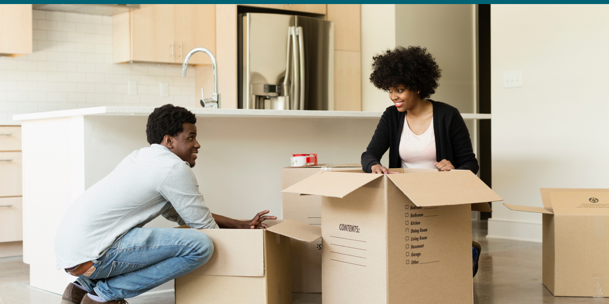 Couple Packing Boxes