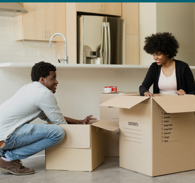 Couple Packing Boxes