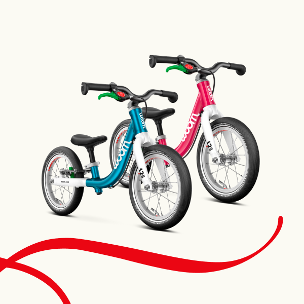 woom GO 1 in metallic blue and hot pink