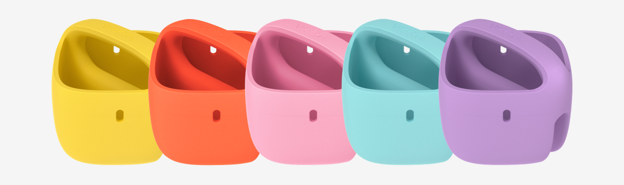 All five colors of the POP Bike Basket lined up in a row — yellow, orange, pink, blue, and purple.