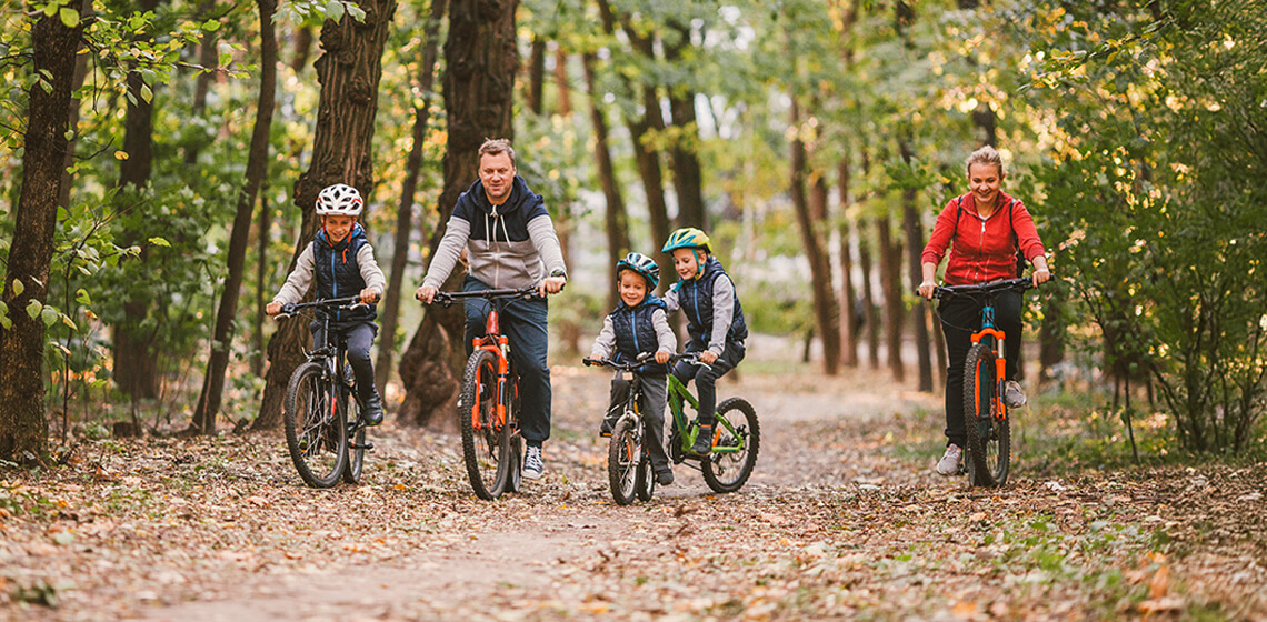 Family riding bikes