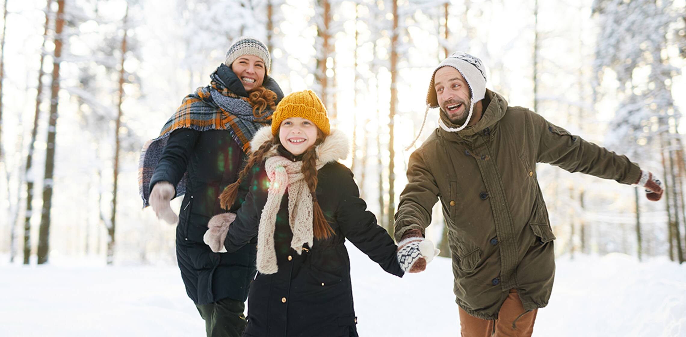 Family playing in snow