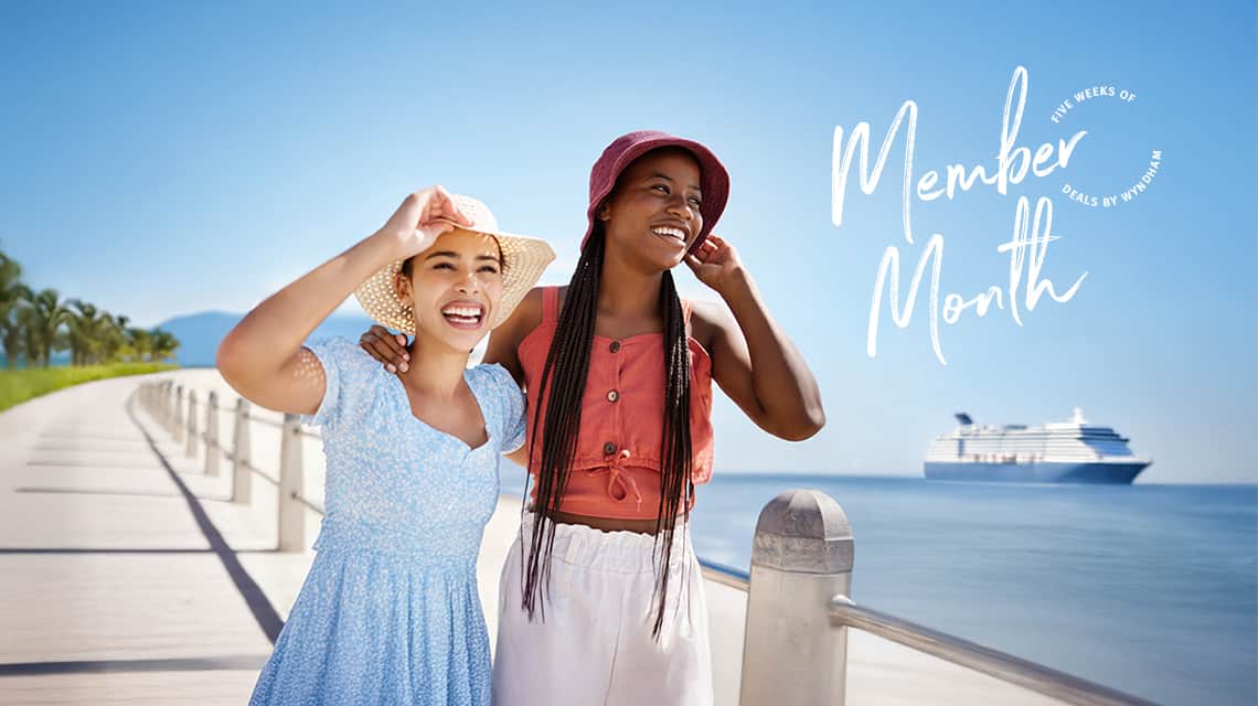 Friends with cruise ship in background