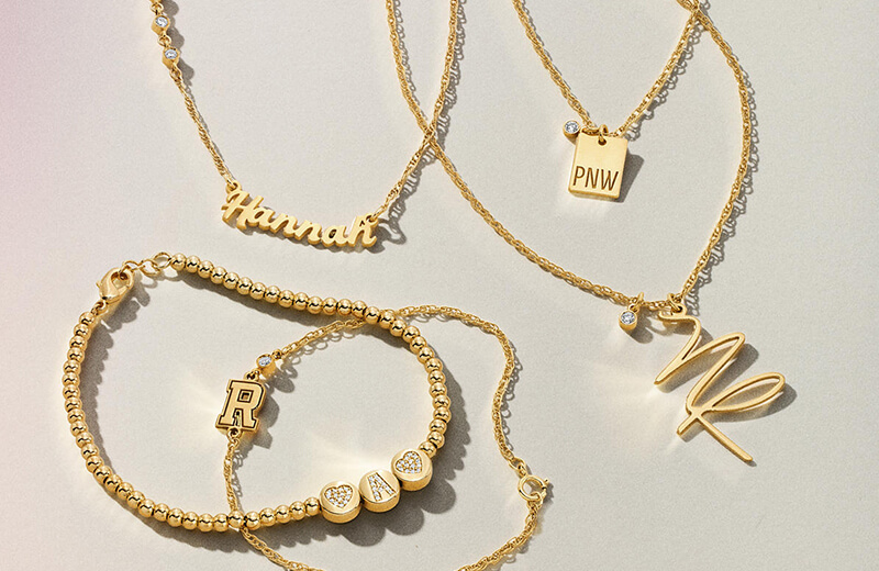 Image showcasing sunning personalized Jewelries in gold - Necklaces and Bracelets.