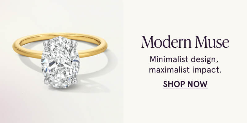 An oval-cut diamond ring with a gold band. Modern muse. Minimalist design, maximalist impact. Click here to shop now