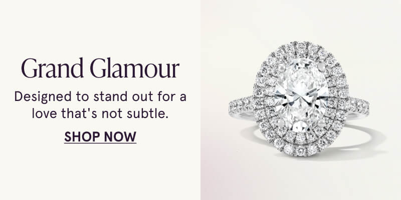 An oval-cut multi-diamond ring with a diamond band. Grand glamour. For love that's not subtle. Click here to shop now