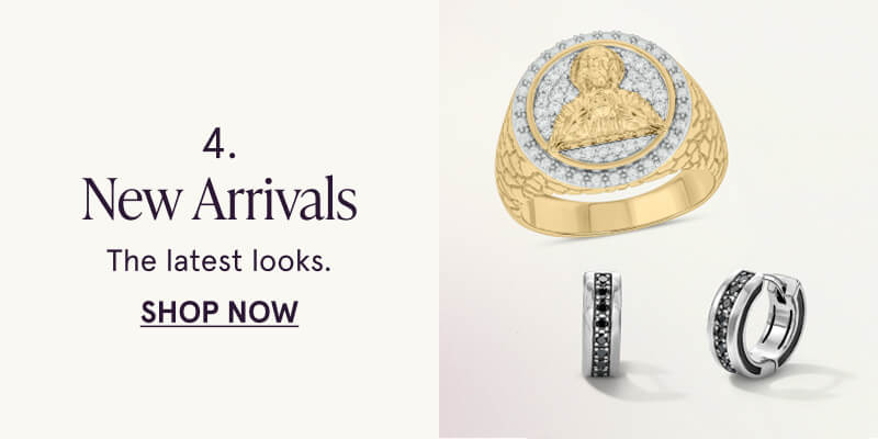 A pair of black diamond hoops and a bold gold diamond ring. New arrivals. Click here to shop now
