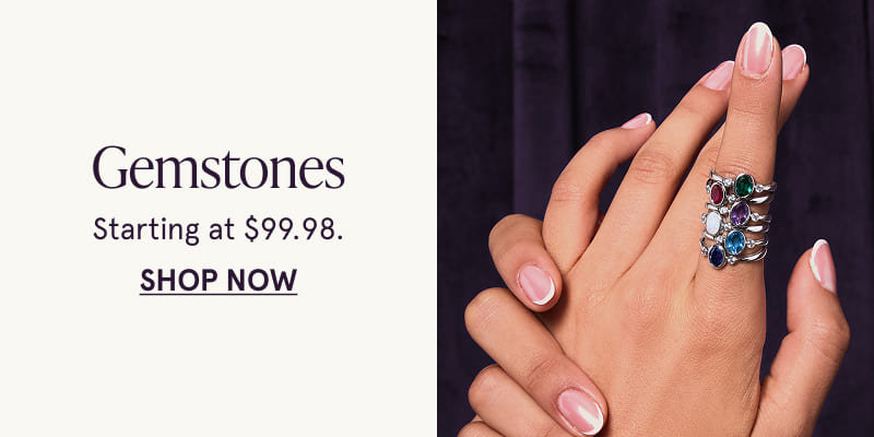 A model wearing colorful gemstone rings stacked on their index finger. Gemstones starting at $99.98. Click here to shop now