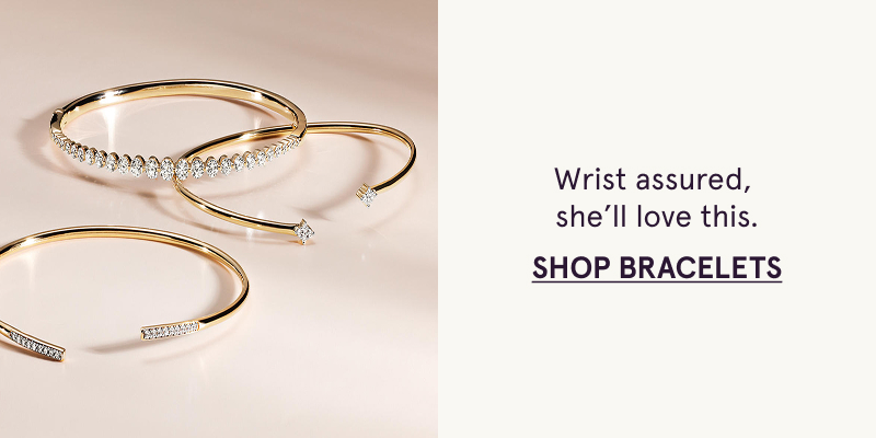 Three gold and diamond bangles. Wrist assured, she’ll love this. Click here to shop bracelets