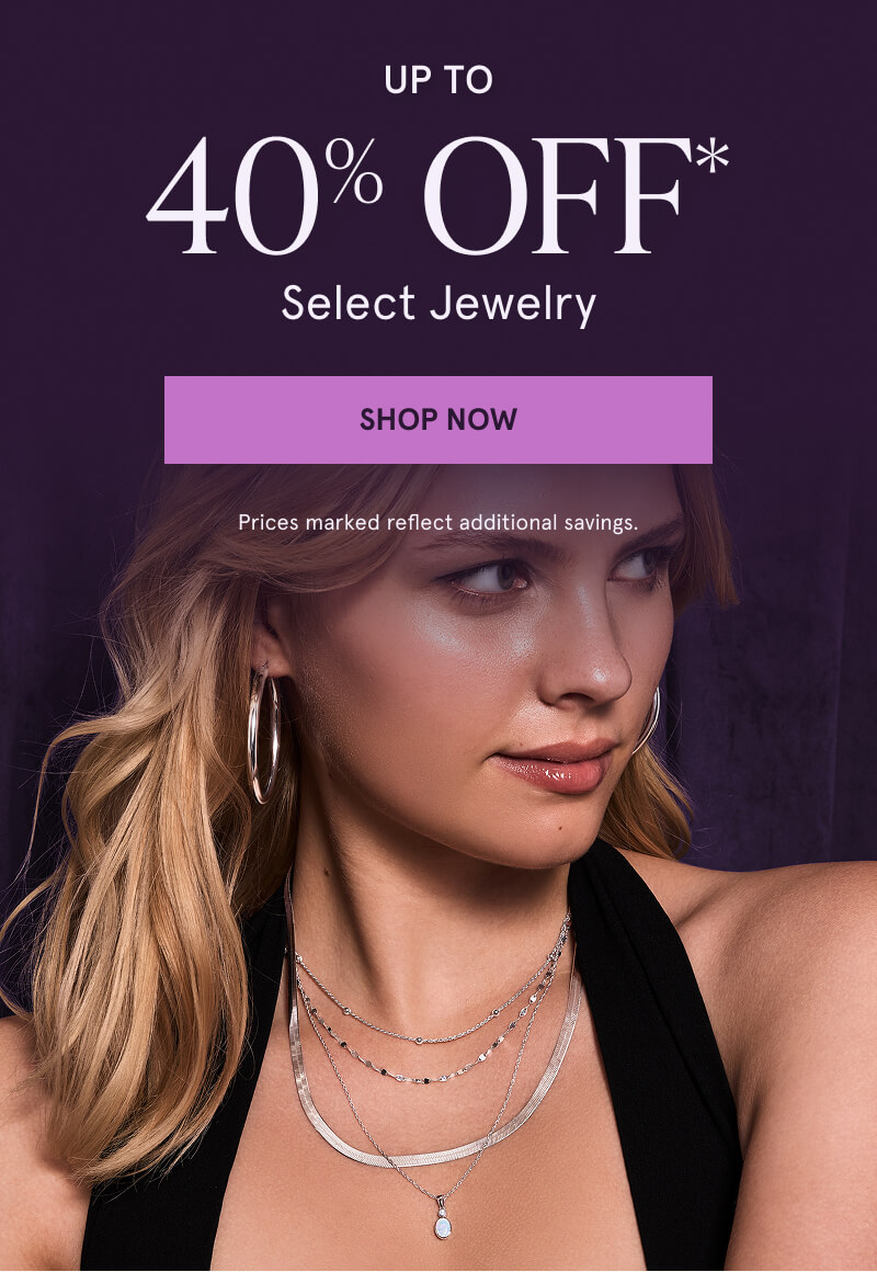 Model wearing dainty gold and diamond jewelry. Up to 40% OFF* Select Jewelry. Prices reflect savings. Click here to shop now
