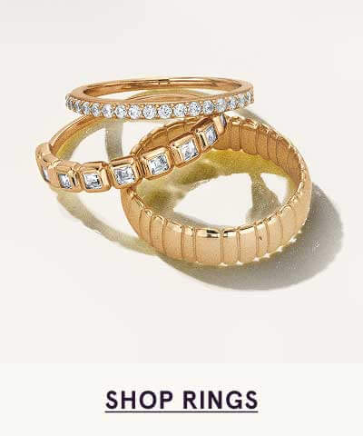 Gold rings with diamond details. Click here to shop rings