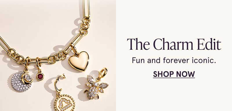 Charm bracelet, with interchangeable charms including heart, moon and zodiac sign. The charm edit. Fun & forever iconic. Click here to shop now