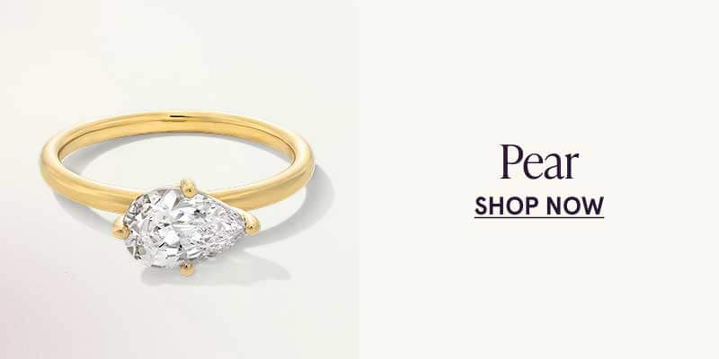 A gold ring with a pear-shaped diamond. Click here to shop pear-shaped styles