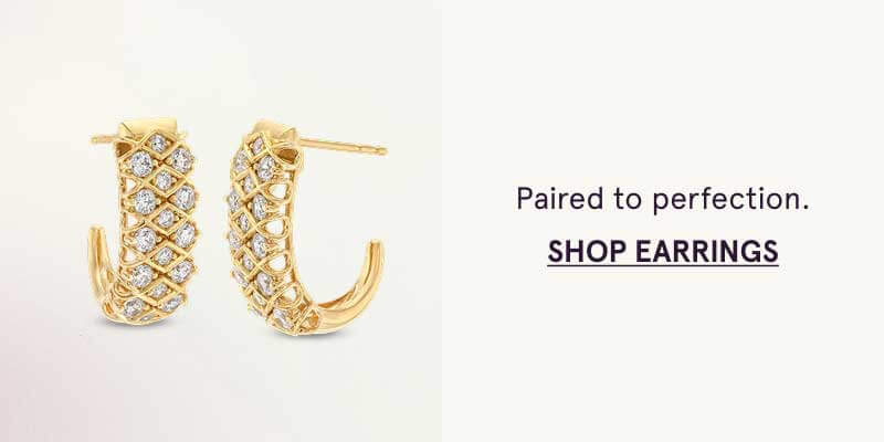 Yellow gold hoops with lattice-style design and diamonds set within. Paired to perfection. Click here to shop earrings
