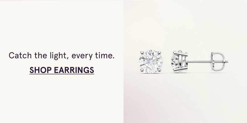 Silver-toned studs with traditional round-cut diamonds. Catch the light. Click here to shop earrings