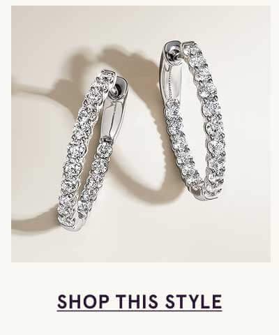 Pair of white gold hoops, lined with continuous round pavé-set lab-grown diamonds. Click here to shop this style