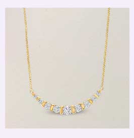 Gold box chain features a curved 