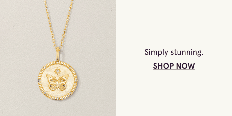 A gold necklace with a butterfly medallion pendant. Simply stunning. Click here to shop now