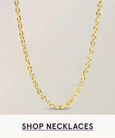 Classic, delicate golden link chain. Click here to shop necklaces